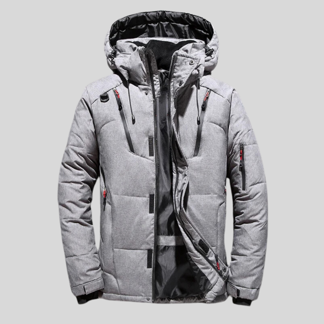 Charmante winterjas met capuchon voor ultieme warmte en tijdloze elegantie | Marcel