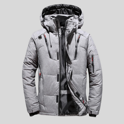 Charmante winterjas met capuchon voor ultieme warmte en tijdloze elegantie | Marcel