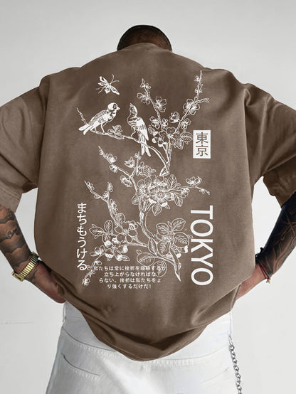 Heren T-shirt met bloemen- en vogelprint in koffie