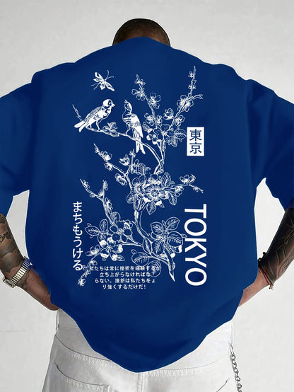 Heren T-shirt met bloemen- en vogelprint in blauw